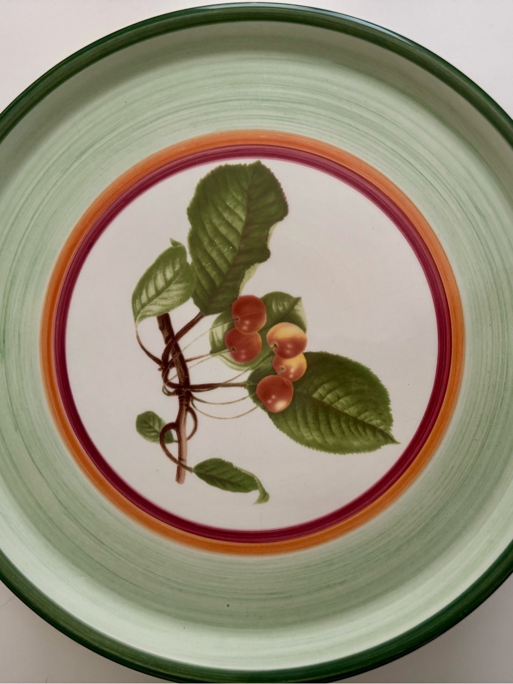 Villeroy & Boch Green Rim Cherry Cake Stand with Orange Accent